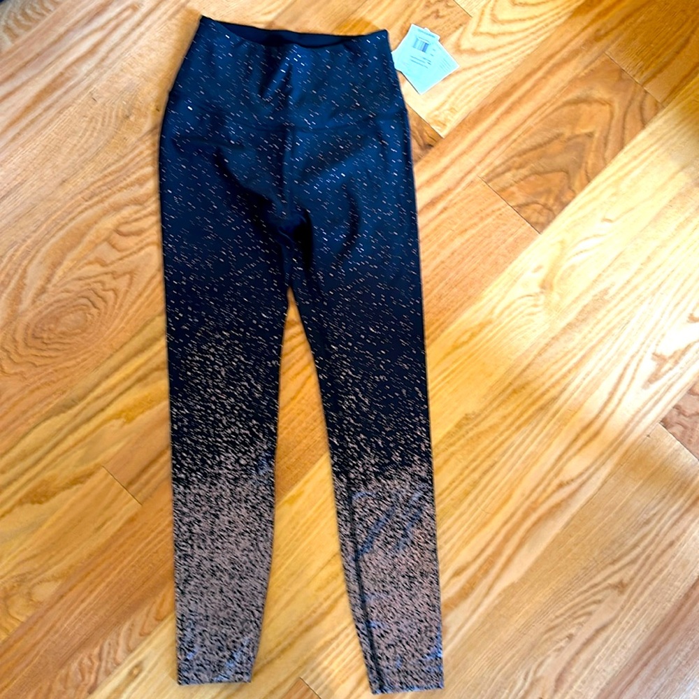 Brand new BEYOND YOGA black and gold tights
